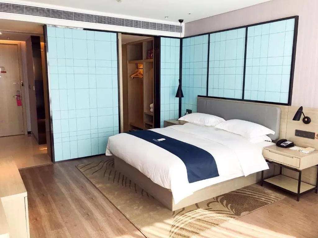 Bed in Echarm Hotel An'xi Hengxing Coach Station