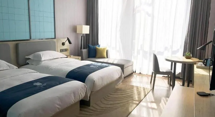 Bed in Echarm Hotel An'xi Hengxing Coach Station