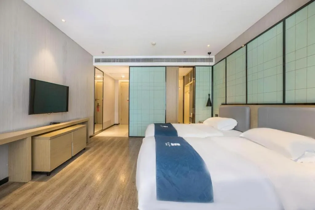 Bed in Echarm Hotel An'xi Hengxing Coach Station