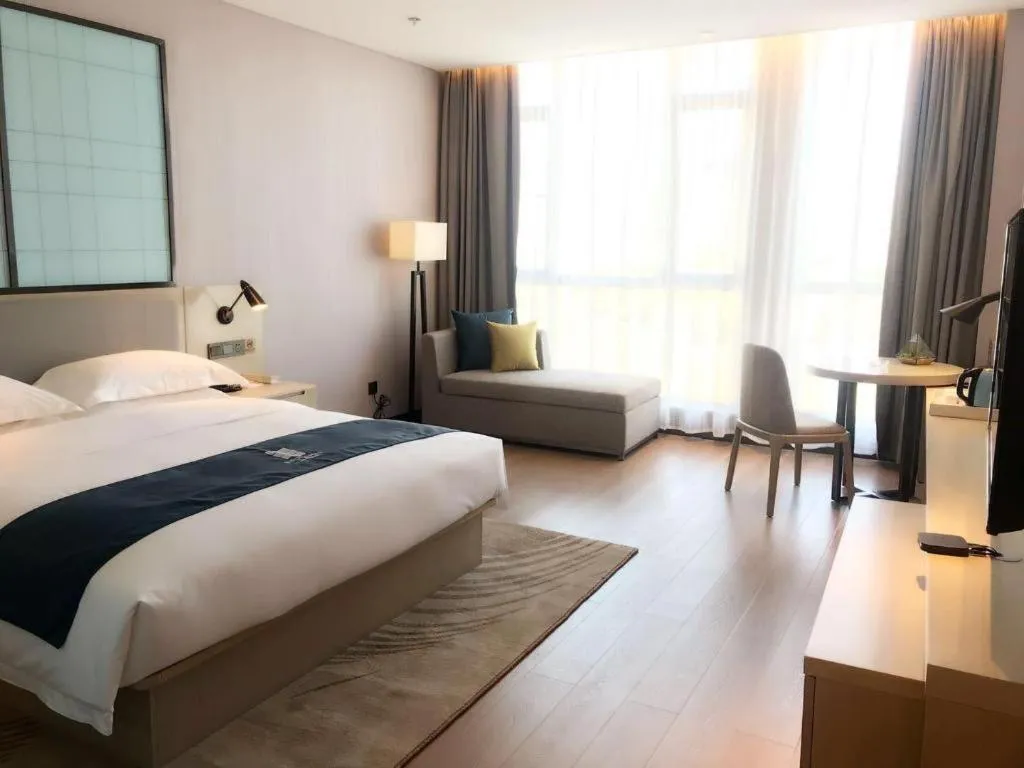 Bed in Echarm Hotel An'xi Hengxing Coach Station