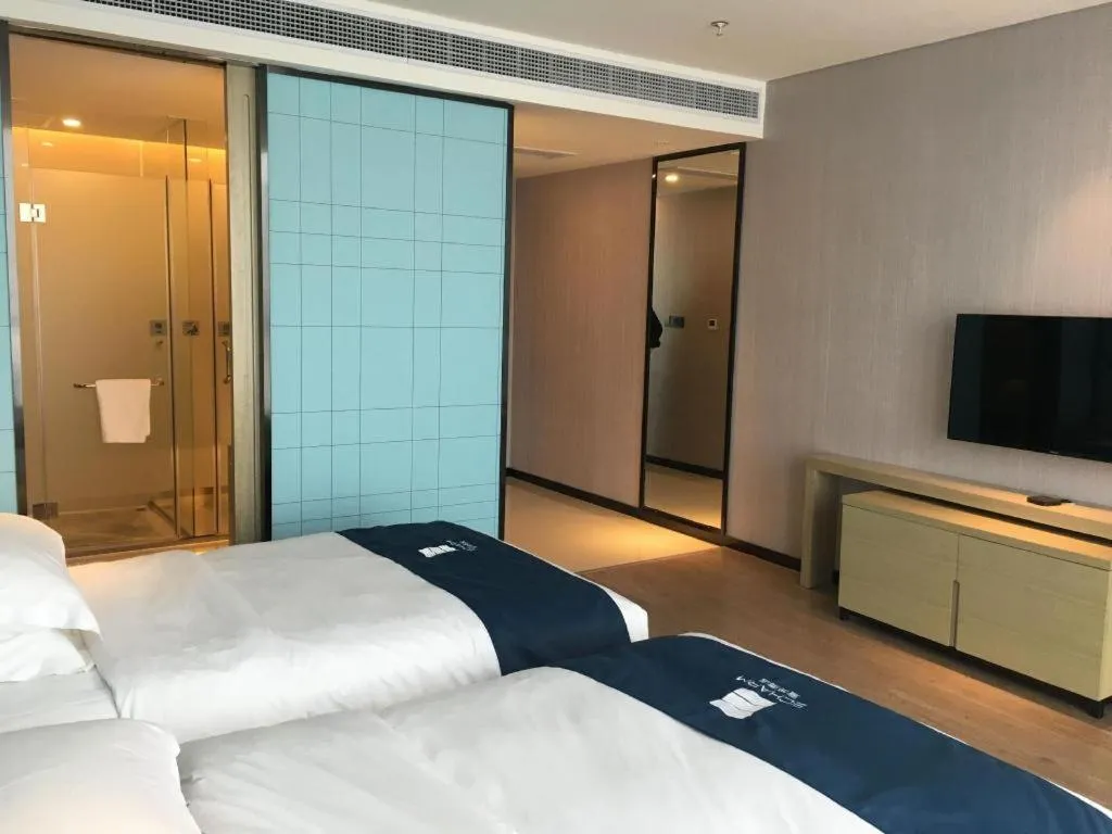 Bed in Echarm Hotel An'xi Hengxing Coach Station