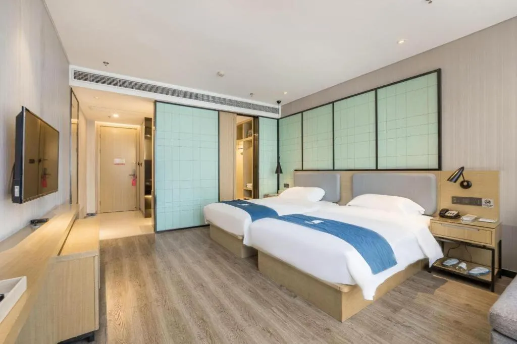 Bed in Echarm Hotel An'xi Hengxing Coach Station