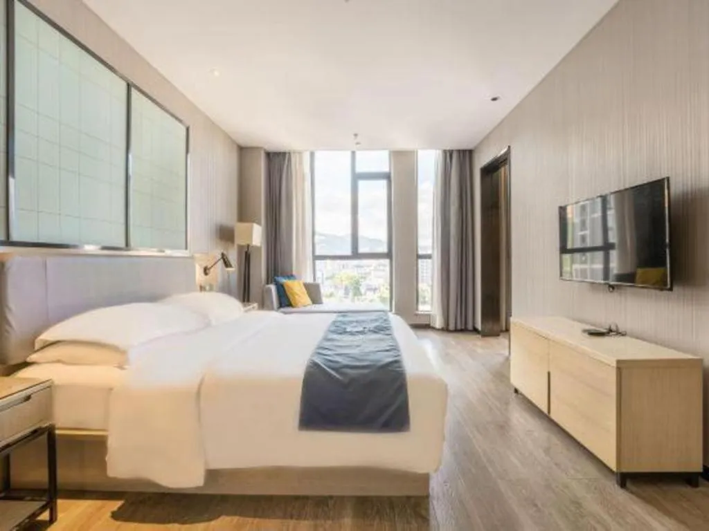 Bed in Echarm Hotel An'xi Hengxing Coach Station