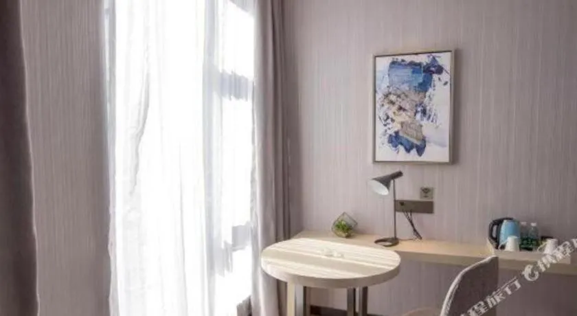 Bed in Echarm Hotel An'xi Hengxing Coach Station