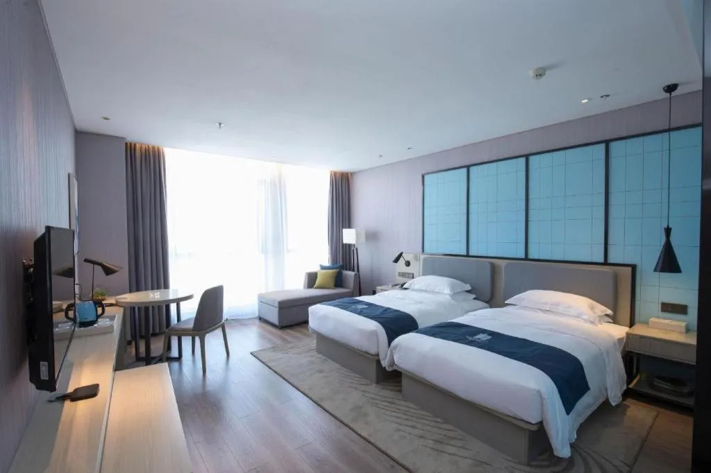 Bed in Echarm Hotel An'xi Hengxing Coach Station