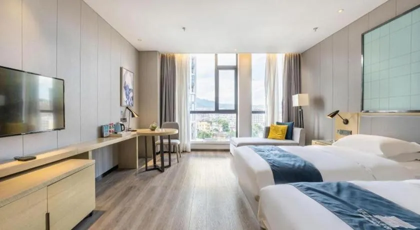 Bed in Echarm Hotel An'xi Hengxing Coach Station