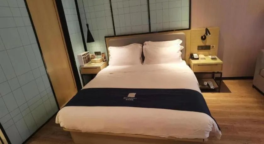 Bed in Echarm Hotel An'xi Hengxing Coach Station