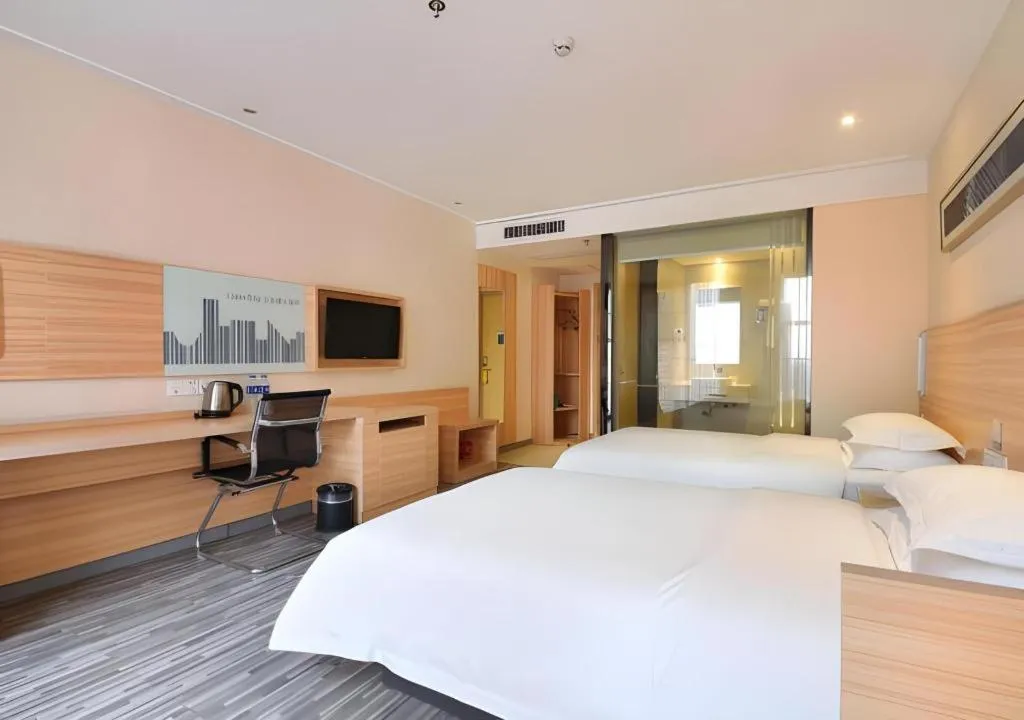 Bed in City Comfort Inn Wuhan Panlongcheng Baishang Shopping Center