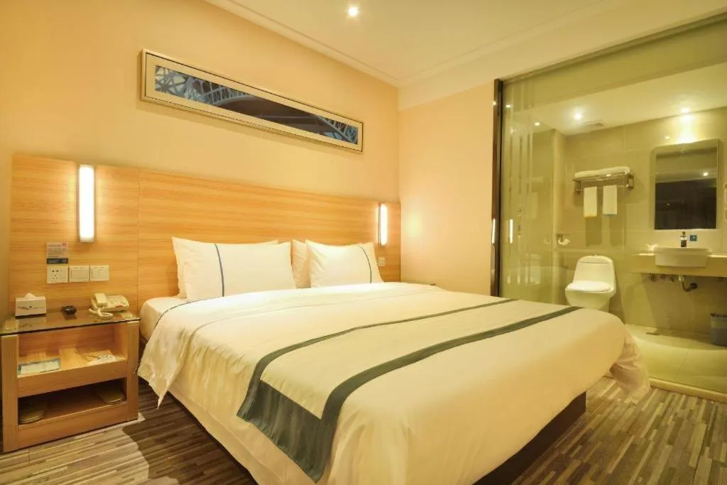 Bed in City Comfort Inn Wuhan Panlongcheng Baishang Shopping Center