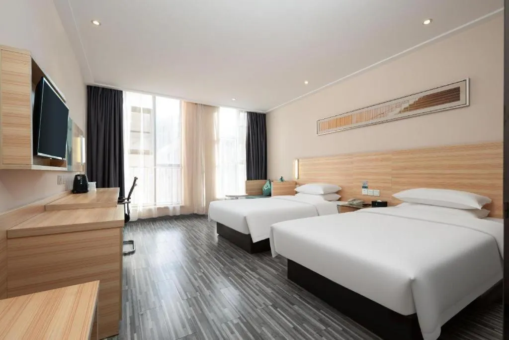 Bed in City Comfort Inn Wuhan Panlongcheng Baishang Shopping Center