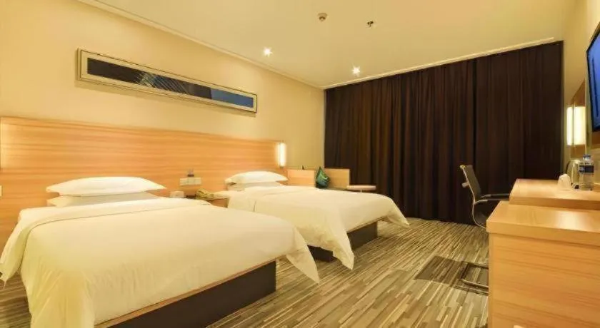 Bed in City Comfort Inn Wuhan Panlongcheng Baishang Shopping Center
