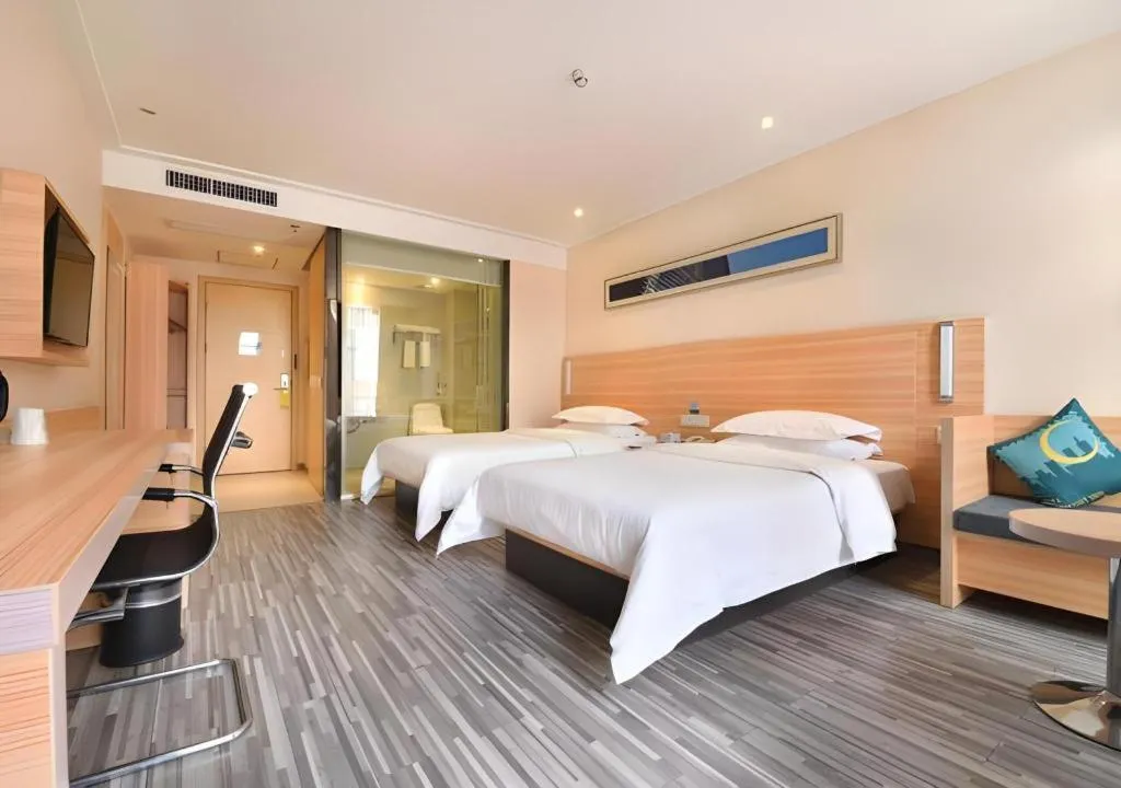 Bed in City Comfort Inn Wuhan Panlongcheng Baishang Shopping Center