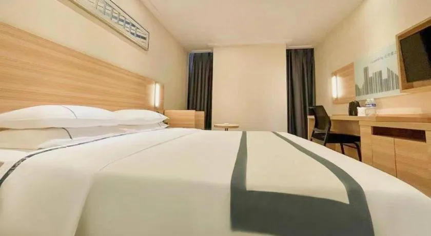 Bed in City Comfort Inn Wuhan Panlongcheng Baishang Shopping Center