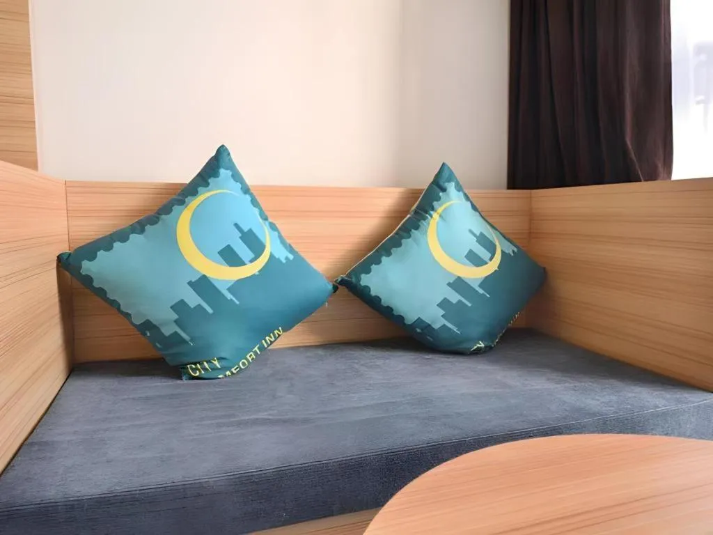 Bed in City Comfort Inn Wuhan Panlongcheng Baishang Shopping Center