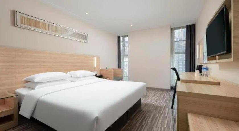 Bed in City Comfort Inn Wuhan Panlongcheng Baishang Shopping Center