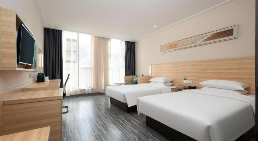 Bed in City Comfort Inn Wuhan Panlongcheng Baishang Shopping Center