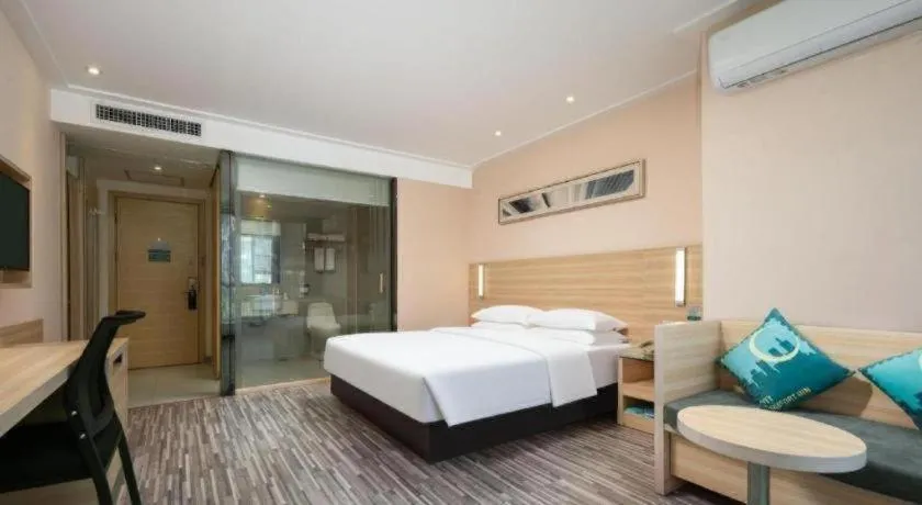 Bed in City Comfort Inn Wuhan Panlongcheng Baishang Shopping Center