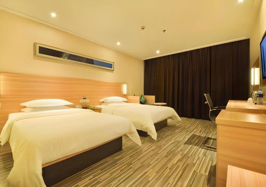 Bed in City Comfort Inn Wuhan Panlongcheng Baishang Shopping Center