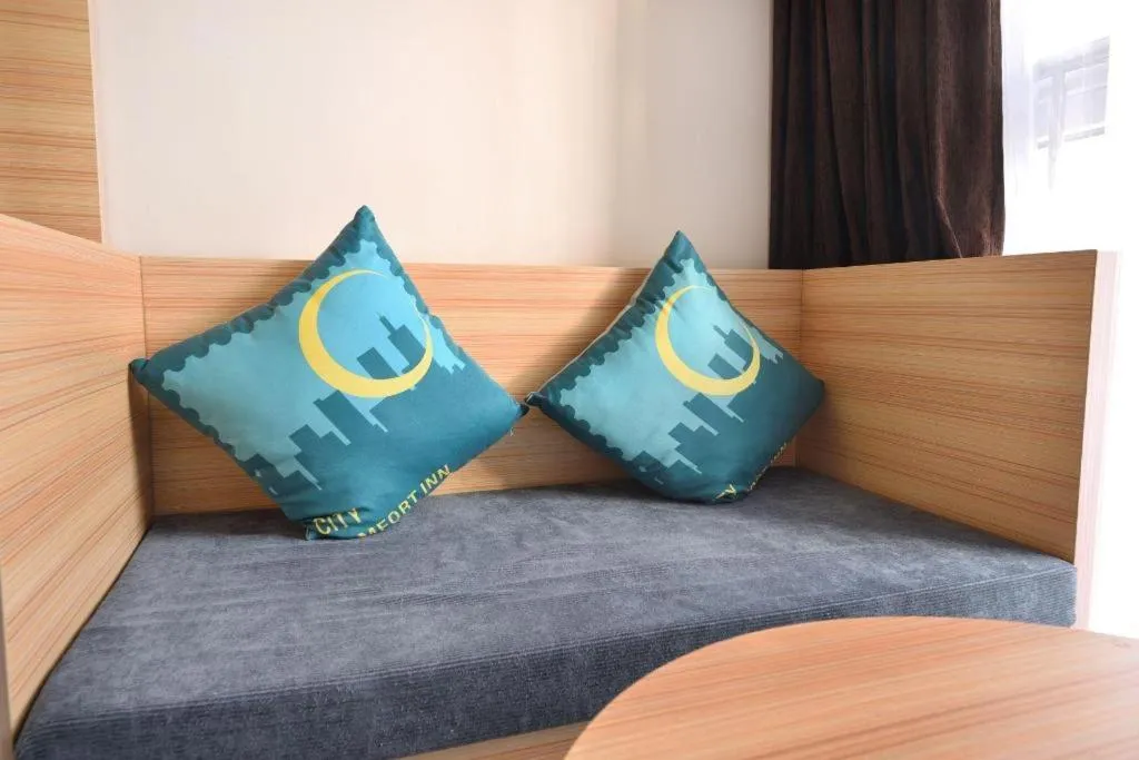 Bed in City Comfort Inn Wuhan Panlongcheng Baishang Shopping Center