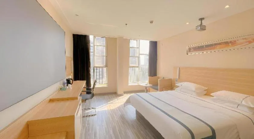 Bed in City Comfort Inn Wuhan Panlongcheng Baishang Shopping Center