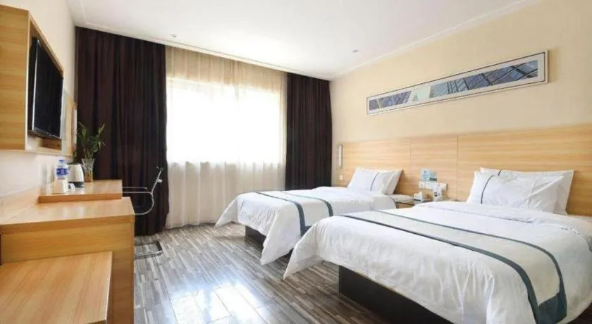 Bed in City Comfort Inn Wuhan Panlongcheng Baishang Shopping Center