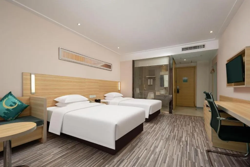 Bed in City Comfort Inn Wuhan Panlongcheng Baishang Shopping Center