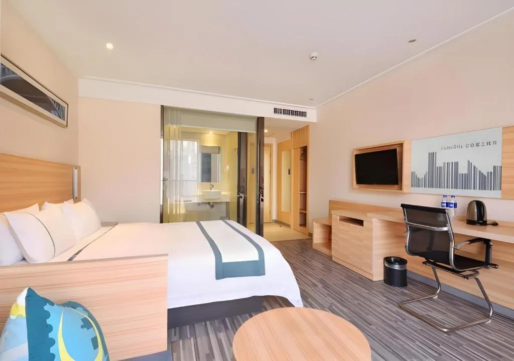 Bed in City Comfort Inn Wuhan Panlongcheng Baishang Shopping Center