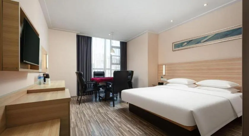 Bed in City Comfort Inn Wuhan Panlongcheng Baishang Shopping Center