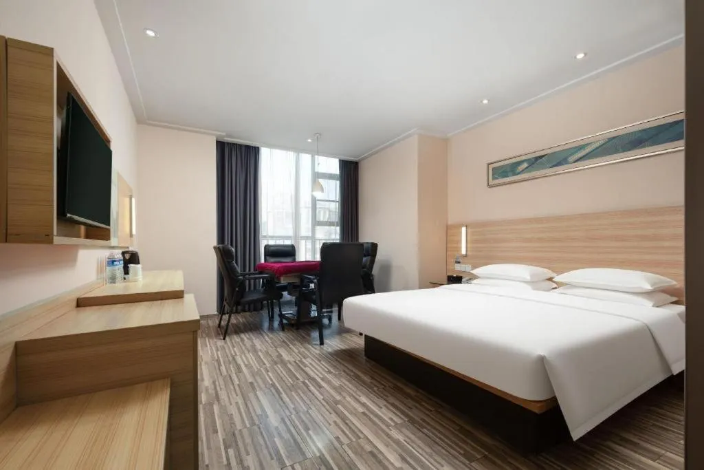 Bed in City Comfort Inn Wuhan Panlongcheng Baishang Shopping Center