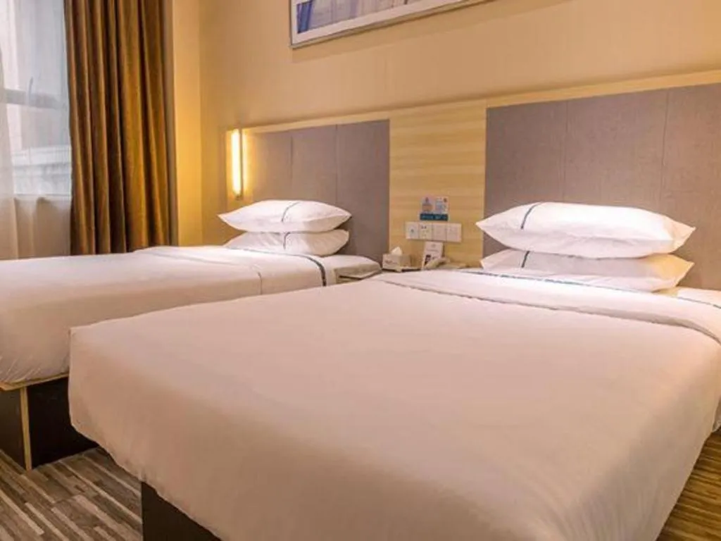 Bed in City Comfort Inn Guangzhou Zengcheng Yonghe Yongkang Road