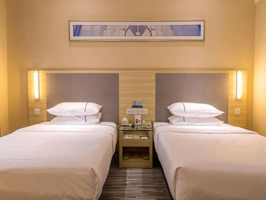 Bed in City Comfort Inn Guangzhou Zengcheng Yonghe Yongkang Road