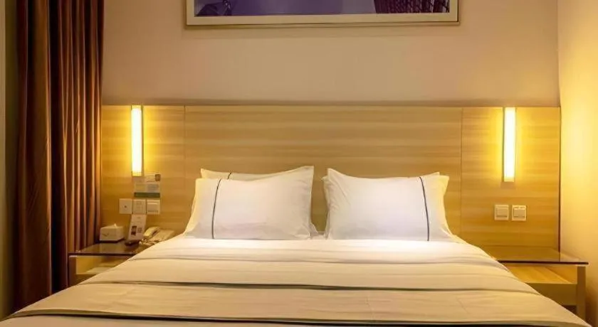 Bed in City Comfort Inn Guangzhou Zengcheng Yonghe Yongkang Road