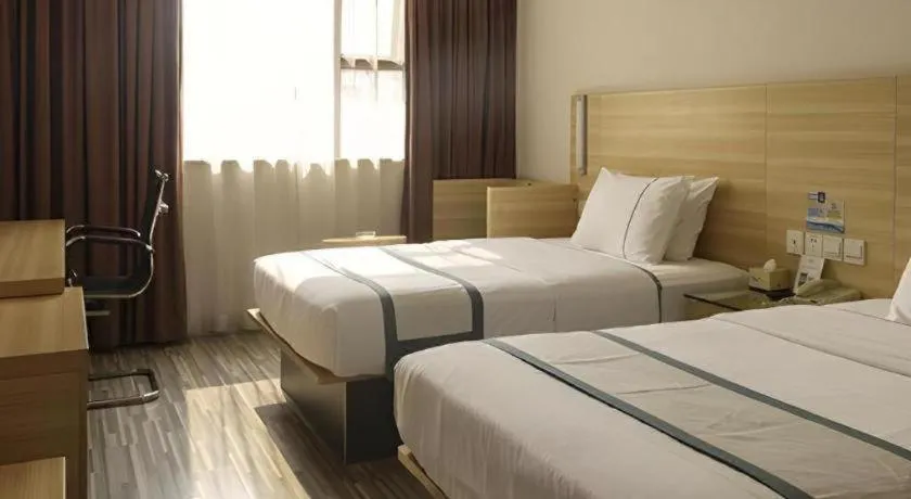 Bed in City Comfort Inn Guangzhou Zengcheng Yonghe Yongkang Road