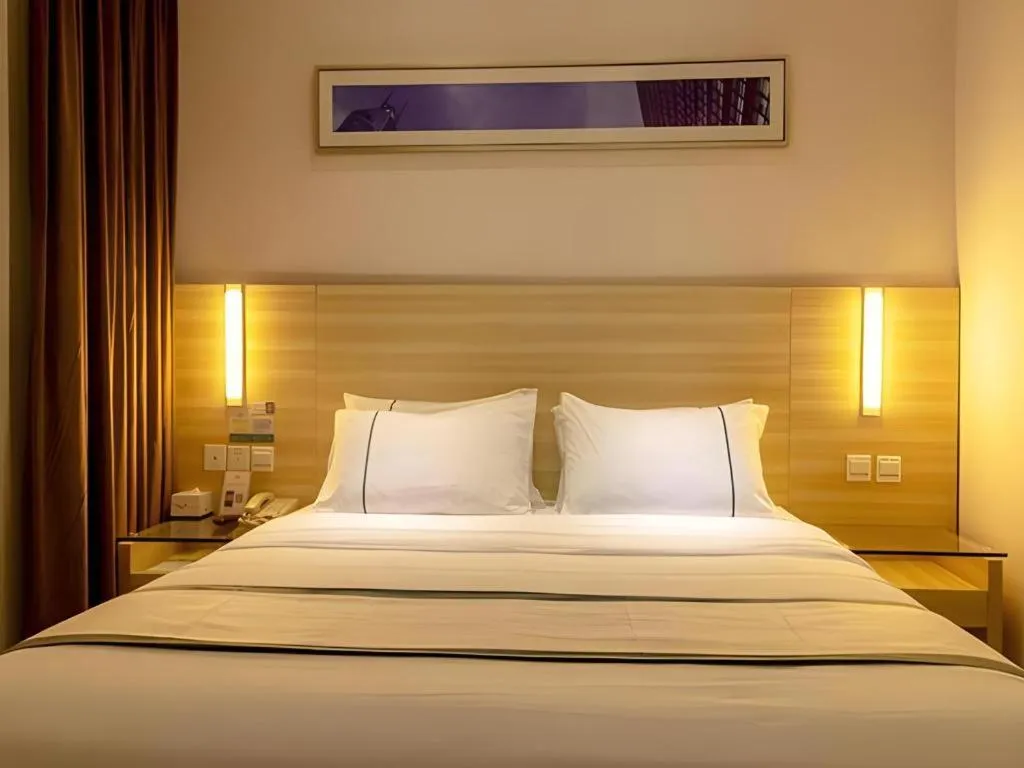 Bed in City Comfort Inn Guangzhou Zengcheng Yonghe Yongkang Road