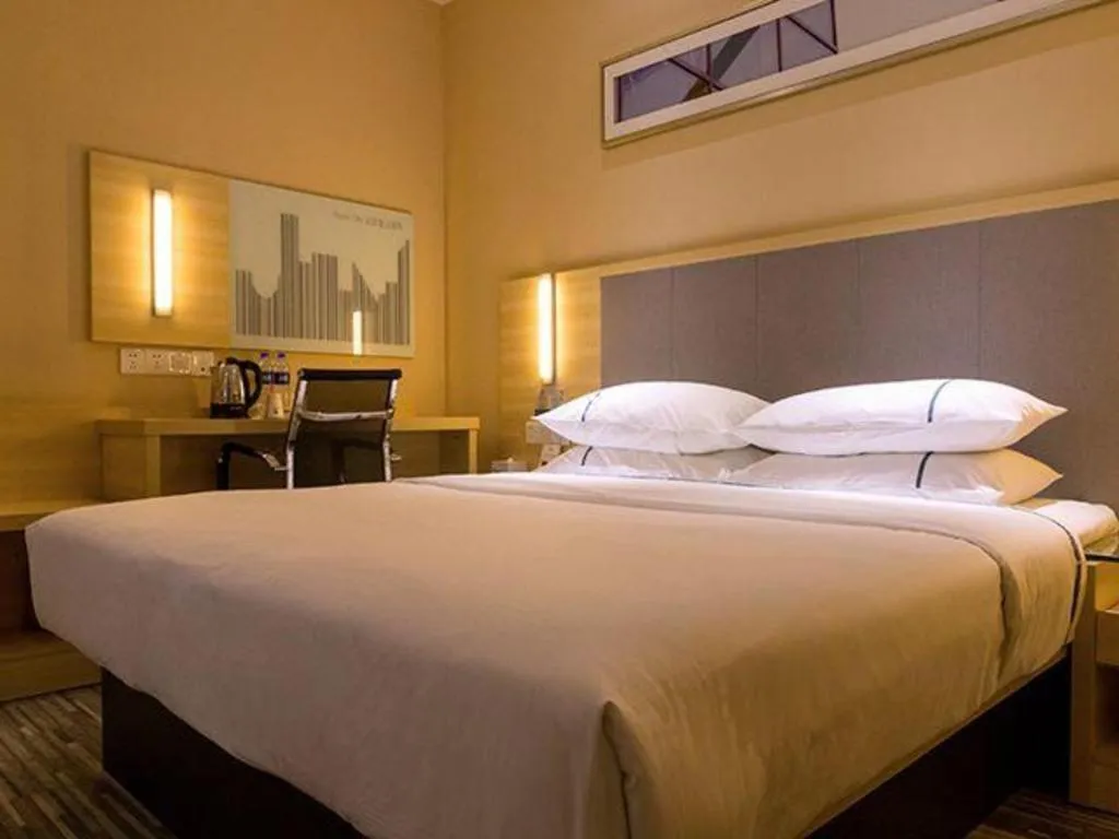 Bed in City Comfort Inn Guangzhou Zengcheng Yonghe Yongkang Road