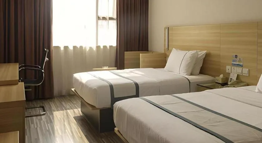 Bed in City Comfort Inn Guangzhou Zengcheng Yonghe Yongkang Road