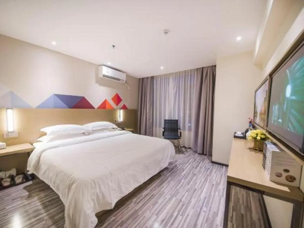 Bed in Borrman Hotel Guilin High-speed Railway North Station Evergrande Plaza