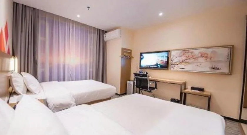Bed in Borrman Hotel Guilin High-speed Railway North Station Evergrande Plaza