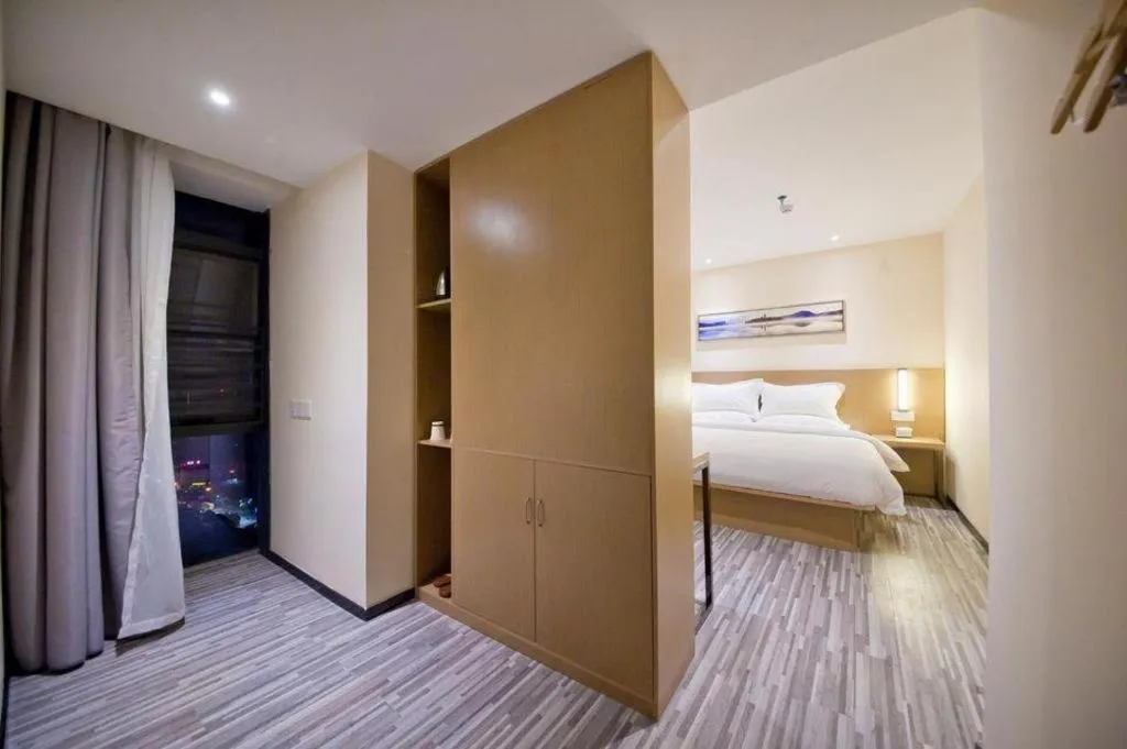 Bed in Borrman Hotel Guilin High-speed Railway North Station Evergrande Plaza