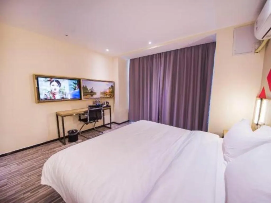 Bed in Borrman Hotel Guilin High-speed Railway North Station Evergrande Plaza