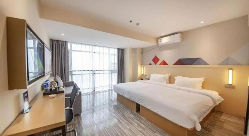 Bed in Borrman Hotel Guilin High-speed Railway North Station Evergrande Plaza