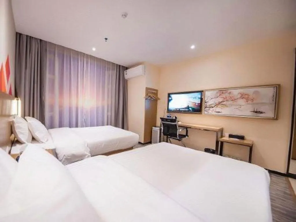 Bed in Borrman Hotel Guilin High-speed Railway North Station Evergrande Plaza