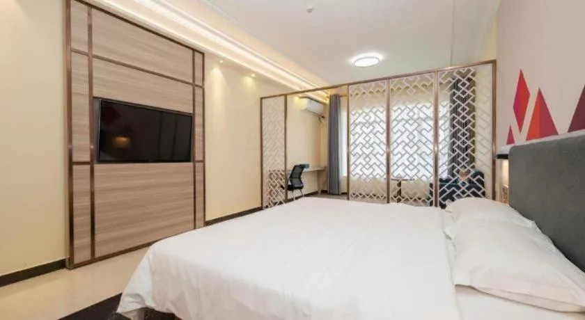 Bed in Borrman Hotel Guilin High-speed Railway North Station Evergrande Plaza