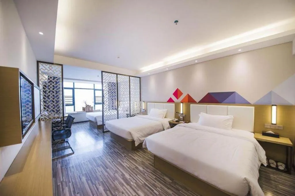 Bed in Borrman Hotel Guilin High-speed Railway North Station Evergrande Plaza