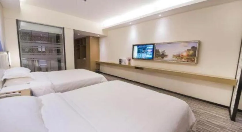 Bed in Borrman Hotel Guilin High-speed Railway North Station Evergrande Plaza