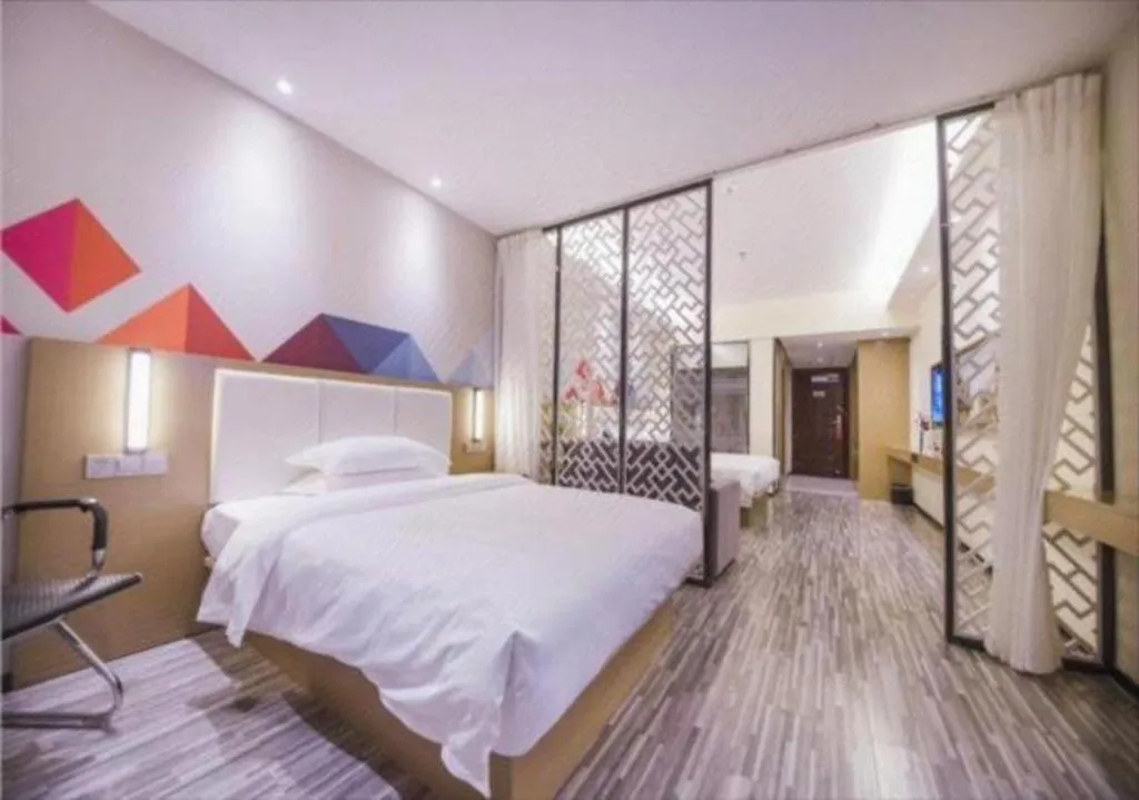 Bed in Borrman Hotel Guilin High-speed Railway North Station Evergrande Plaza