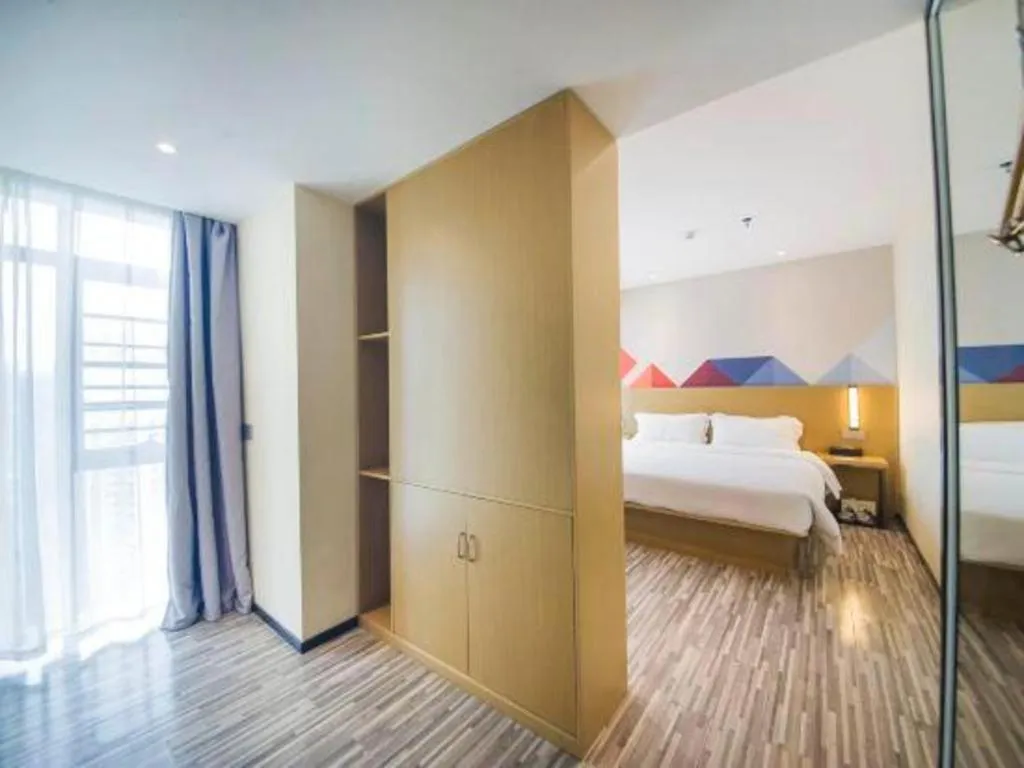 Bed in Borrman Hotel Guilin High-speed Railway North Station Evergrande Plaza