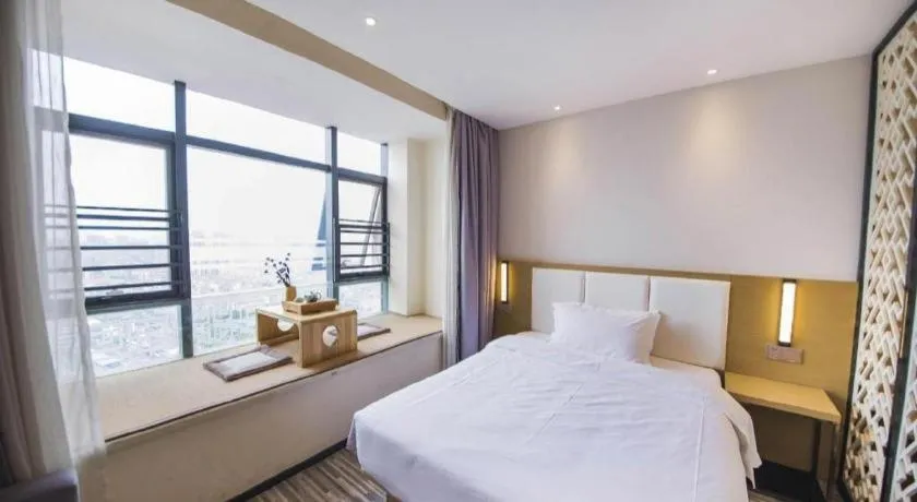 Bed in Borrman Hotel Guilin High-speed Railway North Station Evergrande Plaza