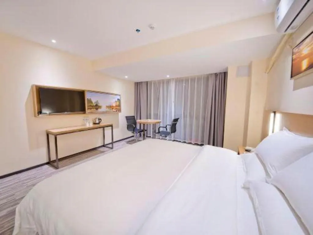 Bed in Borrman Hotel Guilin High-speed Railway North Station Evergrande Plaza