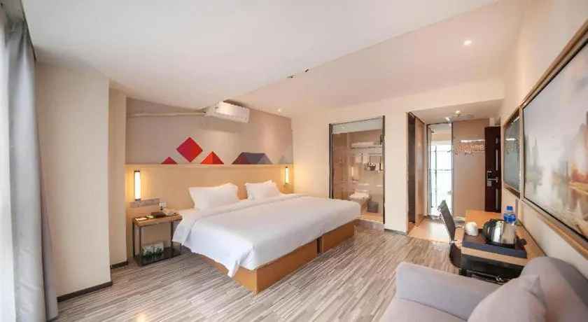 Bed in Borrman Hotel Guilin High-speed Railway North Station Evergrande Plaza